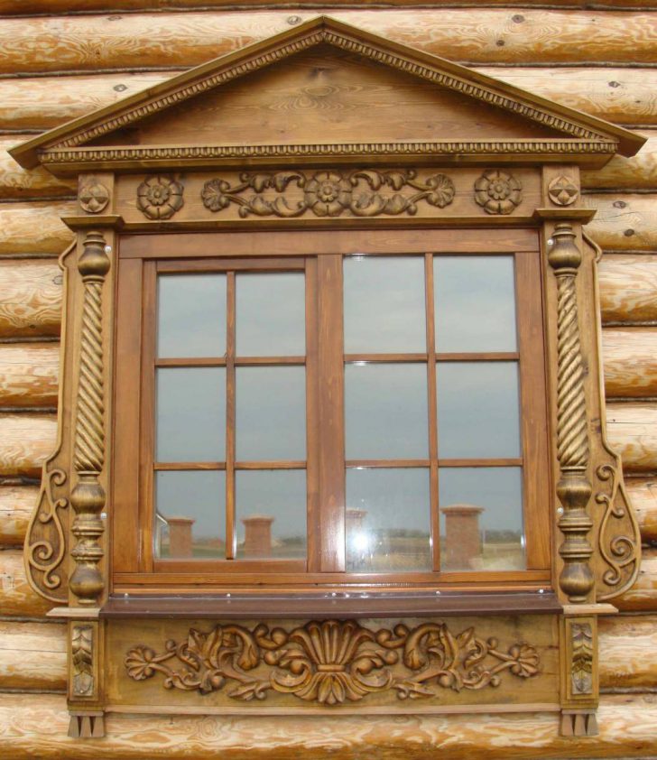 Накладні лиштви на вікна Приклад накладної лиштви на вікні дерев'яного будинку