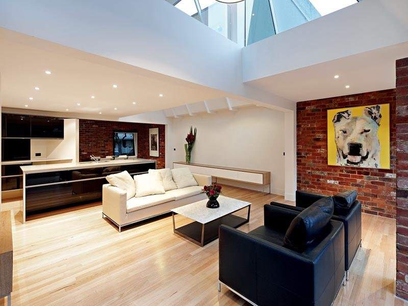 Сучасний інтер’єр вітальні з цегляною стіною: стиль, матеріали та ідеї оформлення 192 - Int Mebel Сучасний інтер’єр вітальні з цегляною стіною: стиль, матеріали та ідеї оформлення 191 - Int Mebel